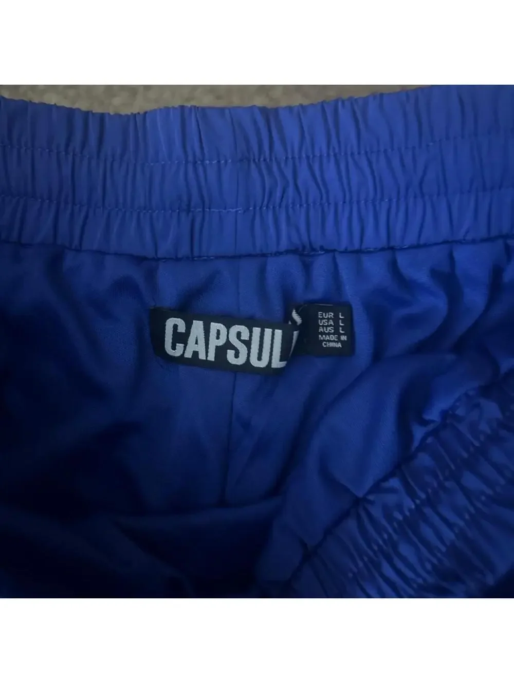 Capsulle blue mesh panel track suit set New with tags. Size: L